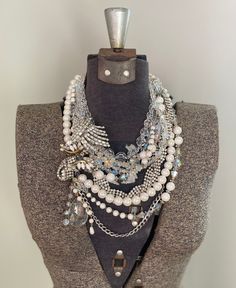 * This is a CUSTOM ORDER, please allow 2-3 weeks for creation! I will be in contact with you the entire time as you choose what specialized rhinestone pieces you want in your unique statement piece made just for you. * How stunning is this ivory white pearl and crystal necklace?!  There are a ton of sparkles in this lovely ensemble!  Repurposed rhinestone pieces dating from the 1940s-60s are used throughout the piece to give it a unique sparkle unlike rhinestone pieces created today.  The vintag Bridal Costume Jewelry Necklace With Bling, Bridal Crystal Necklace, Wedding Necklaces With Rhinestones, Glamorous Jewelry With Bling, Dazzling Jeweled Diamond Necklaces, Evening Diamond Jeweled Necklaces, Dazzling Diamond Jeweled Necklace, Opulent Silver Jeweled Jewelry, White Rhinestone Necklace With Bling Style