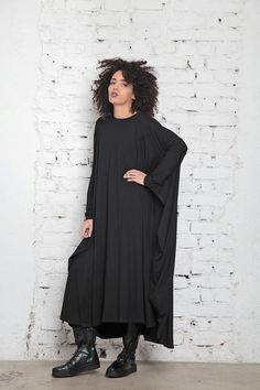 Black Maxi Dress, Women Maxi Dress, Black Kaftan Maxi Dress Maxi caftan dress in soft viscose jersey: |HANAMI| GARMENT FEATURES: * Comfy, easy to wear piece with striking design * Clean, minimalistic maxi dress silhouette * Loose crew neckline * Long sleeved with dramatic draping effect * Made from quality soft viscose jersey COLOUR OPTIONS: This product also comes in the following color options: - black; - rose ash; - grey; - dark navy; - red. SIZE & FIT: Model is 175cm and wears size S. CO Plus Size Kimono Dress, Plus Size Caftan, Black Kaftan, Dress Cape, Maxi Dress Plus Size, Steampunk Dress, Batwing Dress, Plus Size Kimono, Dress Kaftan