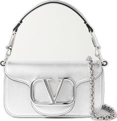 High-end Silver Shoulder Bag With Palladium Hardware, Luxury Silver Crossbody Shoulder Bag, High-end Silver Shoulder Bag With Silver-tone Hardware, High-end Silver Bag With Palladium Hardware, High-end Silver Top Handle Shoulder Bag, Silver Luxury Clutch Shoulder Bag, Luxury Silver Clutch Shoulder Bag, Luxury Shoulder Bag With Silver-tone Logo Plaque, Luxury Rectangular Bag With Silver-tone Logo Plaque