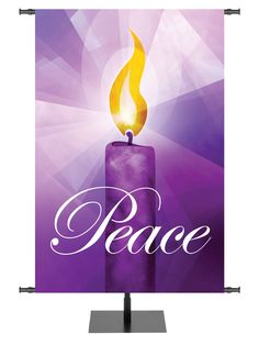 a purple candle with the word peace on it and an image of a flame coming out of it