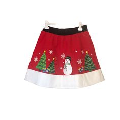 Merry & Bright Woman’s Christmas Tree Novelty Skirt Retro Red Felt 100% Polyester New With Tag Elastic Waistband Red Cotton Skirt For Winter, White Cotton Winter Skirt, Red Bottoms For Christmas Holiday, Winter Holiday Cotton Bottoms, Red Cotton Holiday Bottoms, Red Cotton Bottoms For Holiday, Fitted Holiday Skirt, Festive Red Holiday Skirt, Red Festive Holiday Skirt