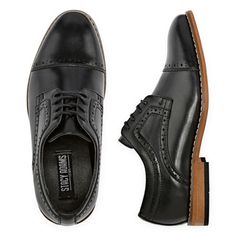 Start him out right with this updated classic. The Stacy Adams Dickinson Cap Toe Oxford features intricate perfing details on the toe and collar, a dress style sole, and a stacked style heel. This is one cap toe that will have any young man looking like he was born with a natural sense of style.Features: ComfortClosure Type: Lace-UpShoe Heel Height: FlatUpper/Outer Base Material: 100% PolyuretheneShoe Lining Material: UnlinedSole Material Content: 100% RubberToe Type: Cap ToeCare: Spot Clean, Wi Classic Closed Toe Dress Shoes With Cushioned Footbed, Fitted Lace-up Dress Shoes With Rubber Sole, Spring Wingtip Fitted Oxfords, Spring Fitted Oxfords With Brogue Detailing, Spring Cap Toe Oxfords With Branded Insole, Fitted Closed Toe Oxfords For Spring, Fitted Round Toe Lace-up Shoes For Spring, Fitted Lace-up Shoes With Round Toe For Spring, Spring Fitted Lace-up Shoes With Round Toe