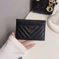 Introducing the epitome of sophistication and style: the Classic GG Wallet Card Holder - Luxury Edition. Crafted with meticulous attention to detail and unparalleled craftsmanship, this accessory seamlessly merges timeless elegance with modern functionality. Made from the finest quality materials, the Classic GG Wallet exudes luxury at every touch. Its iconic GG monogram pattern embossed on premium leather not only showcases impeccable taste but also speaks volumes about your discerning eye for Double G Logo, Leather Card Holder Wallet, Chic Quilts, Gg Monogram, G Logo, Monogram Pattern, Logo Set, Wallet Card, Everyday Accessories