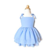 This adorable chiffon dress is so soft and comfy to wear. It features a short vintage length with built-in layers for the perfect tulip shape. The straps tie in a sweet bow for an easy, adjustable fit. Shown in the Sky Blue color option, and in a size 2T. Available in 10+ colors! if you don't see what you're looking for contact me and I will see what I can do. For custom sizing, select your child's current size and add their chest, waist, and shoulder-to-hem measurements in the note section of t Summer Tutu Dress With Bow For Dress-up, Spring Dress With Bow Straps For Dress-up Occasions, Chiffon Dresses With Ruffles For Dress-up, Summer Dress-up Bubble Romper With Ruffles, Dusty Sage, Sky Blue Color, Tulip Dress, Light Yellow, Dusty Rose