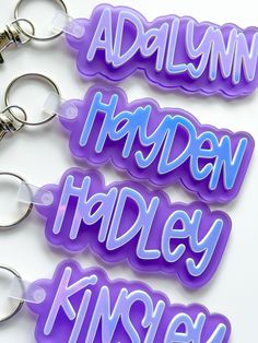 three keychains with the words harley, harley and kinsey printed on them