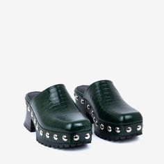 Classic closed-toe clog with wraparound chrome studs. The rubber-bottomed ayous-wood outsole is grippy, lightweight, and flared at the heel. End Of Season Sale, Shoe Lover, Wrap Around, Sale Items, Clogs, Emerald, My Style, Skin, Heels