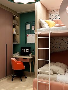 a bedroom with two bunk beds and a desk