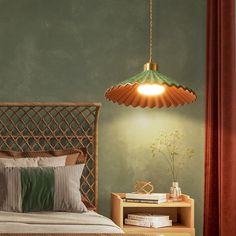 a bedroom with green walls and a rattan headboard on the bed, next to a lamp