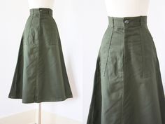 "♛Beautiful 1970s deadstock/unworn skirt is crafted from a high quality cotton twill in a lovely neutral olive green that goes wonderfully with just about every color you can throw at it. This military-inspired skirt is one we are lucky to have in multiples! Super high waist with wide belt loops, front button and metal zipper closure, hip pockets, rear pockets with button closures for a sleek fit, and the perfect A-line shape. All are unworn, made in the USA, and most have their original tags st Retro A-line Cotton Bottoms, Vintage Cotton Flared Skirt, Vintage Cotton Flared Skirt Bottoms, Retro Cotton Skirt With Pockets, Vintage Green Skirt With Pockets, Vintage Cotton Relaxed Skirt, Sailor Trousers, Australian Navy, Military Shorts