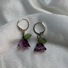 DETAILS: ⋆ ˚｡⋆୨୧˚ adorable purple flower earrings with leaves recommend taking them off before swimming or showering  ᰔ PACKAGING: *The earrings come in a cute organza bag packed inside a bubble packaging bag *There are also some stickers and a little note for you in the package SHIPPING & PROCESSING: *Orders will be shipped from Rhineland-Palatinate via DHL with non-insured shipping (contact me if you want insured shipping but it'll cost more then), I don't assume any liability for lost packages If you have further questions or there's anything wrong with the item you ordered, don't hesitate to contact me Purple Flower Charm Earrings, Trendy Purple Flower Earrings For Gift, Trendy Purple Flower Jewelry, Cute Silver Flower Earrings As Gift, Cute Silver Flower Earrings For Gift, Cute Flower Charm Earrings As Gift, Cute Flower Charm Earrings For Gift, Trendy Lavender Earrings For Gift, Cute Purple Dangle Jewelry