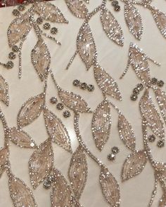 a close up view of the beaded and sequin embellishments on this dress