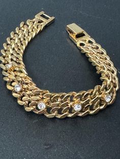 Retro gold Tone chunky curb link chain bracelet with clear crystal diamanté 18cm x 1.2cm Elegant Metal Cuban Link Bracelet With Curb Chain, Gold Chain Cuban Link Metal Bracelet, Elegant Gold Chain Bracelet With Rhinestones, Formal Cuban Link Bracelet With Chunky Chain, Cuban Link Bracelet With Cubic Zirconia, Formal Cuban Link Chunky Chain Bracelet, Formal Chunky Cuban Link Bracelet, Rhinestone Chain Link Jewelry, Gold Crystal Chain Bracelet With Bling