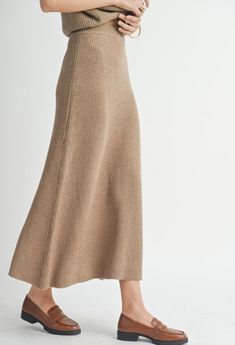 This midi skirt is the perfect fall staple! It is the perfect color that goes with every top and jacket you own! Pair it with our " Crosby Ribbed Turtleneck Vest" for a matching fit! 100% polyester Sweater Midi Skirt, Midi Sweater Skirt, Ribbed Knit Fabric, Ribbed Skirt, Aline Skirt, Dark Taupe, Ribbed Turtleneck, Sweater Material, Sweater Blouse