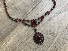 Antique Garnet Necklace, Victorian Bohemian, Deep Color, Period Jewelry, KH - Etsy Polska Antique Garnet Necklace, Bohemian Garnet Necklace, Antique Garnet Pendant Necklace, Victorian Round Necklace With Jewels, Victorian Jeweled Necklaces, Vintage Garnet Gemstone Necklace, Victorian Garnet Necklace, Vintage Round Necklaces With Stones, Antique Gemstone Beaded Necklace