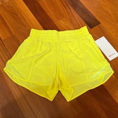 New With Tag Lululemon Hotty Hot Hr Short 4" *Lined Size 6 Electric Lemon 100% Authentic ***The Pictures Were Taken With The Actual Shorts*** Very Clean, Smoke-Free And Pet-Free Environment Yellow Go-dry Shorts For Summer, Yellow Athleisure Athletic Shorts For Beach, Yellow Summer Athletic Shorts For Training, Yellow Nylon Sports Shorts, Yellow Athletic Shorts For Summer Training, Yellow Summer Training Activewear, Yellow Summer Activewear For Training, Nylon Shorts For Light Exercise In Summer, Yellow Athletic Shorts With Built-in Shorts For Yoga