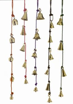 several bells hanging from the ceiling