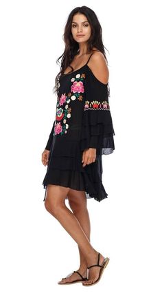 FROM THE BEACH TO THE DINNER TABLE, this embroidered dress will turn heads. This cold shoulder dress is made of soft, comfortable rayon. This fiesta tunic has a short length. This summer dress stops right above the knee. Wear this floral dress with a slip or matching nude underwear for a night on the town. Toss this bali dress over your favorite swimsuit for the pool. Wear this boho tunic top with shorts or leggings. You’ll grab this house dress over and over again. FLORAL EMBROIDERY AND RUFFLES Black Cold Shoulder Summer Dress, Spring Beach Black Embroidered Dress, Spring Beach Embroidered Black Dress, Black Embroidered Beach Dress For Spring, Bohemian Black Embroidered Dress For Spring, Casual Embroidered Boho Dress For Vacation, Embroidered Boho Summer Dress, Casual Boho Dress With Embroidered Hem For Spring, Casual Boho Dress With Embroidered Hem For Summer