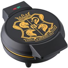 the hogwarts crest is on top of an electronic device