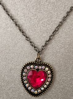 Looking for a cute necklace to match that outfit? Or to match those Red Heart Earrings? (see listing "Red Heart Earrings.")  Look no further!  This piece is perfect for many occasions. The necklace is 11.9"h with a 1"h x 0.7"w heart charm. Made in a clean, smoke-free home1 Valentine's Day Heart Pendant Necklace For Party, Cute Heart Necklace For Valentine's Day Party, Heart-shaped Necklace For Mother's Day Party, Heart Necklace For Mother's Day Party, Mother's Day Heart Pendant Necklace For Party, Mother's Day Party Heart Pendant Necklace, Mother's Day Heart Necklace For Party, Heart Beads Heart-cut Necklace For Party, Party Heart Necklace With Heart Cut Beads