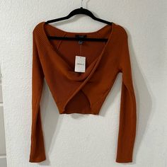 Forever 21 Rust Color Long Sleeve Crop Top Women’s Size L. Size Large But Fits A Women’s Small Best, Super Cute Color, No Flaws, Never Worn, Has Stretch, Twist Detail In Front, Nwt! Measurements: P2p: 16” Length: 18” (Shoulder To Back Hem) Fall Crop Top For Day Out, Fall Day Out Crop Top, Trendy V-neck Crop Top For Fall, Fitted Crop Top For Fall Day Out, Fitted Crop Top For Day Out In Fall, Stretch Crop Top For Date Night In Fall, Fall Trendy V-neck Crop Top, Forever 21 Trendy V-neck Crop Top, Trendy V-neck Crop Top By Forever 21