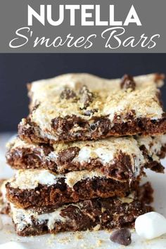 chocolate nutella s'mores bars stacked on top of each other