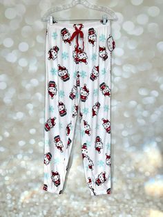 Hello Kitty Christmas Pajama Pants size small. #hellokitty #christmas #pajamas Casual Christmas Holiday Bottoms, Casual Christmas Holiday Pants, Casual Holiday Pants For Christmas, Casual Pants For Winter Holiday, Casual Cotton Pants For Christmas, Casual Cotton Bottoms For Holiday, Christmas Loungewear Pants, Winter Holiday Cotton Bottoms, Casual Christmas Loungewear Bottoms