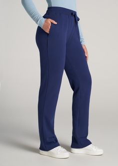 About Our Sweatpants for Tall Women Whether it's a workout or the weekend, these open-bottom tall women's sweatpants look good with just about anything – and they feel even better. Finding sweats when you're tall can be tough, with inseams that land awkwardly above the ankle and silhouettes that are far too baggy for your frame. We designed this pair of sweats to go all the way past your ankles with a straight leg that provides the right balance of comfort and style. The wide drawstring waistban Navy Stretch Activewear For Loungewear, Navy Relaxed Fit Sweatpants For Sports, Navy Loungewear Pants, Navy Athleisure Pants For Loungewear, Comfort Stretch Sportswear Bottoms, Sporty Lounging Pants, Stretch Activewear For Loungewear With Straight Hem, Navy Athleisure Sweatpants For Gym, Comfortable Stretch Sweatpants With Straight Hem