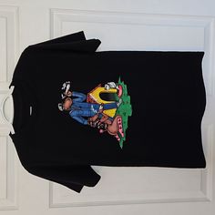 For Skateboard Or Snoop Dog Lovers. Or Both. Some May Say Its In Poor Taste, Some May Think Its Dope. Huf Skate Brand And Snoop Dog Collab On This Wild Graphic Tee. Very Colorful Graphic, Great Condition. Never Worn. Size S Pit To Pit: 18in Length: 25.5in Relaxed Fit Cartoon Print Tops For Streetwear, Urban Tops With Cartoon Print For Summer, Urban Cartoon Print Tops For Summer, Urban Summer Tops With Cartoon Print, Black T-shirt With Cartoon Print For Streetwear, Hip Hop Cartoon Print Tops For Streetwear, Urban Character Print Tops For Streetwear, Fun Cartoon Print T-shirt For Streetwear, Black Hip Hop T-shirt With Cartoon Print