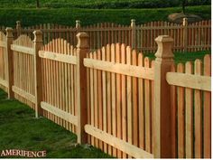 an image of a fence that is in the grass