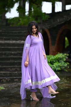 PRODUCT DESCRIPTION :-Shine bright like sunshine!Anarkali :- Pure cottonPant :- CottonDupatta :- Organza silkClosure Used:- Side zipColor:- Lilac purpleCare Instructions :- Dry clean onlyModel Size :- Model is wearing XS sizeModel Height :- 5.5DISCLAIMER :- Slight color variations may occur due to different screen resolution. Purple Cotton Silk Salwar Kameez For Eid, Anarkali Purple Kurta With Mirror Work, Lavender Anarkali Set For Diwali, Semi-stitched Cotton Silk Purple Dupatta, Lavender Anarkali Salwar Kameez, Purple Anarkali Chanderi Kurta, Purple Anarkali Salwar Kameez With Mirror Work, Bollywood Style Lavender Anarkali Set With Zari Work, Purple Anarkali Kurta In Chanderi Fabric