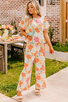 Introducing our Orange Vibrant Floral Printed Short Sleeve Top 2 Piece Pants Set. Expertly designed with a vibrant floral print, this set offers a stylish and versatile addition to your wardrobe. Made with high-quality material, it provides comfort and effortless style for any occasion. Upgrade your look with this must-have set. Size Chart (CM) Sizes Bust Waist Hem_Width Sleeve_Length Length Hip Bottoms Inseam Outseam Relax Relax Relax Relax Relax Relax Relax Relax Relax S 111 67 112 28.9 62 104 Two Piece Set Pants, Neck Details, Bold Floral Print, Pant Sets, Neck Bodycon Dress, Top Pants Set, Mini Slip Dress, Matching Pants, Denim Coat Jacket