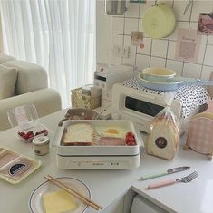 a table topped with toast and other food items