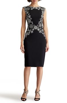 Embroidered floral lace echoes from the yoke to the waist of this elegant sheath dress that'll have you raising a glass in chic style. 40 1/2" length (size 8) Hidden back-zip closure Jewel neck Sleevleess Lined 95% polyester, 5% spandex with 80% polyester, 20% nylon contrast Hand wash, line dry Imported Elegant Cocktail Dress With Floral Embroidery, Elegant Floral Lace Dresses, Elegant Lace Dresses For Work, Elegant Fitted Dress With Floral Embroidery, Elegant Fitted Floral Embroidery Dresses, Elegant Floral Embroidery Dresses For Work, Elegant Floral Embroidered Workwear Dresses, Elegant Workwear Dress With Floral Embroidery, Elegant Floral Embroidery Workwear Dresses