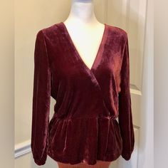 J. Crew Velvet V-Neck Peplum Hem Long Sleeve Wine Blouse Button Cuff Sz 10 Nwt J. Crew Wine Red Crushed Velvet Long Sleeve Blouse Faux Wrap Front V-Neck Style Long Sleeve With Single Button Elastic Cuff Color: Burgundy, Wine Red Size: 10 Condition: Nwt, New With Tags Measurements Taken Flat By Hand Photos Of Measurements Available In Slides Color May Vary Based On Shadows, Lighting, Monitor, Display Settings Ask Questions And/Or Request Additional Photos, Measurements As Needed $110 Classic V-neck Party Top, Formal V-neck Blouse For Fall, Long Sleeve V-neck Top For Work In Fall, Classic Long Sleeve Tops For Date Night, Long Sleeve V-neck Top For Fall Night Out, Long Sleeve V-neck Top For Night Out In Fall, Elegant Long Sleeve V-neck Top For Night Out, Long Sleeve V-neck Top For Fall Party, Fitted V-neck Blouse For Fall