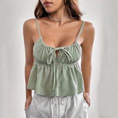 Style: Sexy Fit: Regular Fabric: Cotton Pattern: Solid Element: Cutout,Ruched,Tie Top Length: Crop Neckline: Spaghetti Strap Product Type: Camis Main Composition: Cotton Season: Summer Business Skirt, Female Style, Casual Outerwear, Short Vest, Slim Fit Shorts, Top For Women, Casual Tank Tops, Color Fabric, Tie Top