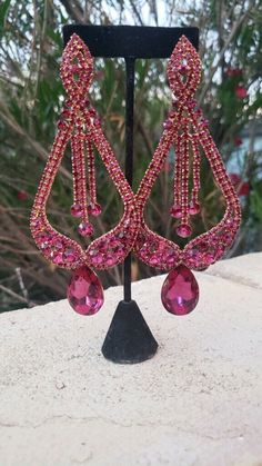 Glamorous Party Chandelier Earrings With Crystals, Elegant Pink Chandelier Earrings, Pink Jeweled Crystal Earrings For Wedding, Pink Dangle Chandelier Earrings, Elegant Pink Chandelier Earrings For Party, Pink Jeweled Dangle Chandelier Earrings, Pink Crystal Rhinestone Earrings For Wedding, Pink Jeweled Earrings For Party, Pink Dangle Crystal Earrings For Evening