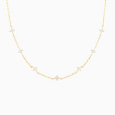 See things clearly in our Shimmer Blossom Necklace. Adorned with sparkling CZs, this necklace is the perfect accessory for day and night. 18k gold plated, 18k rose gold plated, or rhodium plated over brass with a protective coating Cubic zirconia stones 13" chain with a 2" extension, 5mm clusters width Shop the entire Blossom Collection here! Dainty Sparkling Crystal Necklaces, Delicate Cubic Zirconia Necklace With Sparkling Stones, Delicate Necklace With Sparkling Cubic Zirconia, Dainty Sparkling Crystal Necklace, Dainty Sparkling Necklace For Party, Dainty Diamond White Necklace With Sparkling Stones, Dainty White Necklace With Sparkling Stones, Delicate Diamond Necklace With Sparkling Detail, Necklace Chain Lengths