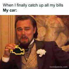 a man in a suit and tie holding up a yellow car shaped brochure that reads, when i finally catch up all my bills my car