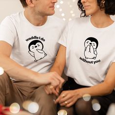 "Penguin Couple Matching Christmas Tshirts, Penguin Couple Shirts , His and Hers Matching Shirts, Penguin Couple Christmas Jumpers Xmas Gift Perfect Christmas gift for any couple that love matching t-shirts or jumpers These sweatshirts are made of premium quality cotton blend for a great quality soft feel and comfortable retail fit.  Our Unisex Sweatshirts are modern fitted, stylish and we use high-quality vinyl ensuring your garment will look fantastic. The soft cotton faced fabric creates a luxury feel. The taped neck adds comfort and the twin needle stitching keeps the sweatshirt durable. Complete with set-in sleeves and a ribbed collar, hem and cuffs.  - Crew neck sweatshirt - Set-in sleeves - Stylish fit - Unisex - Cosy - Comfortable SIZE GUIDE: XS 34\" | S 36\" | M 40\" | L 44\" | XL Funny White T-shirt For Gift, Funny White T-shirt As Gift, Funny White T-shirt Gift, Funny White Tops As Gifts, Funny Graphic Print Tops As Gift, Christmas White Tops With Funny Print, Family Matching Tops With Funny Print For Gift, White Christmas Tops With Funny Print, White Christmas Top With Funny Print