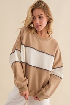 The Kyler Crew Neck Sweatshirt is the perfect combination of cozy and chic. With long sleeves, ribbed trim at the neckline, cuffs and hem, and a piping detail, you'll be rocking a classic and comfortable look for any occasion. As a bonus, it's made of French terry fleece for an extra soft touch! Pre-order yours now in Khaki & Cream. 50% Cotton 50% Polyester Color Block Sweatshirt, French Terry, Piping, Pre Order, Color Block, Photo Editing, Crew Neck Sweatshirt, Round Neck, Relaxed Fit