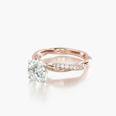 a rose gold engagement ring set with a round diamond