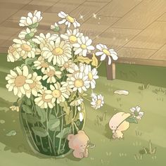 a vase filled with white flowers sitting on top of a grass covered field next to a wooden floor