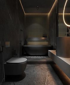 a bathroom with a black tub and white toilet