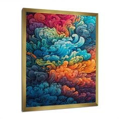 an abstract painting in gold frame with colorful swirls and clouds on the wall above it