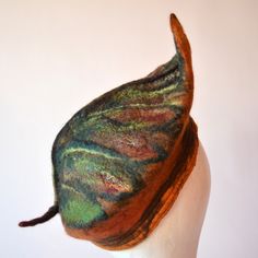 A Unique, handmade French leaf beret. I have created with wool a leaf shape beret in tones of red, brown, yellow, green and orange, cinnamon merino wool. To add texture I used silk and fibers.  I have machine stitched around the brim ♥This Hat is ready to ship. Every hat I make is a unique piece, therefore, if I make more than one of the same design yours will be unique in itself, because it is hand-made. Your hat will, of course, be very close to the original in the photograph, so you can be as Handmade Felt Hats, Costume Unique, Felt Beret, Wood Elf, Hat Handmade, Wool Winter, Winter Cap, Winter Hats For Women, Unique Gifts For Her