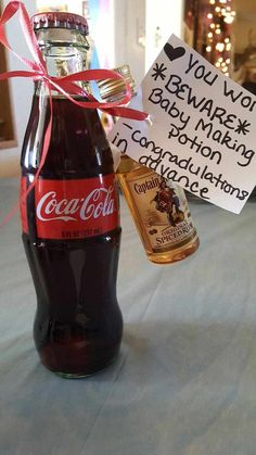 a coca - cola bottle with a sign attached to it