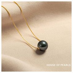 Tahitian Pearl Floating Pendant #baroquepearls #pearlset #pearlsformen #menspearls #PearlChoker #tahitianpearls #tahitianpearlsformen #houseofpearlsoffical #blackpearls #pearls Formal Tahitian Pearl Necklace In Yellow Gold, Formal Yellow Gold Tahitian Pearl Necklace, Elegant Gold Tahitian Pearl Necklaces, Luxury Black Necklace With Pearl Pendant, Luxury Black Pearl Chain Necklace, Elegant Gold Tahitian Pearl Necklace, Luxury Tahitian Pearl Necklace, Tahitian Pearl Round Beads Formal Necklace, Classic Tahitian Pearl Drop Necklaces