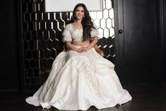 Diana is the perfect pick for the bride who wants a white wedding with a desi touch. Diana features a white lehenga with pearls, diamonds, and a touch of gold beadwork. The blouse has fun ruffled sleeves and a deep V back. Complete the look with its delicate dupatta. DELIVERY TIMEPlease allow 4-6 months for your outfit to arrive. FABRIC DETAILSRaw Silk. Professional cleaning only. White Lehenga, Touch Of Gold, Ruffled Sleeves, Professional Cleaning, White Wedding, Deep V, Lehenga, 6 Months, Bead Work