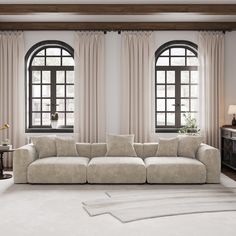 a living room filled with furniture and two large windows covered in white curtained drapes