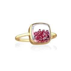 The Core Shaker Ring Ruby in 18-karat gold features a cushion-shaped Kaleidoscope Shaker™ filled with loose round rubies. This ring is water-resistant*. To preserve this piece, consult the care instructions. DescriptionRing with 0.63ct of rubies enclosed in a white sapphire Kaleidoscope Shaker™ in 18-karat rose gold. Materials and Measurements• 0.63ct of Ruby• 18 Karat Gold• Shaker Size: 10x10 mm Details• Made in New York City• Style # R797r New York City Style, Rubies And Diamonds, Ring Ruby, Ruby Diamond, Engraved Items, Ruby Ring, City Style, October Birth Stone, White Sapphire